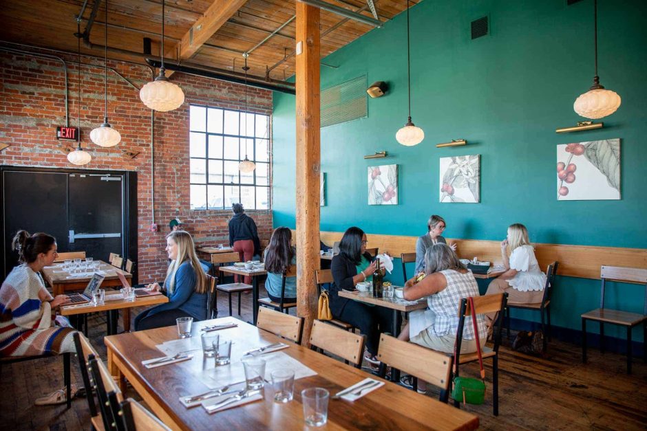 interior of coffeehouse with people having conversation