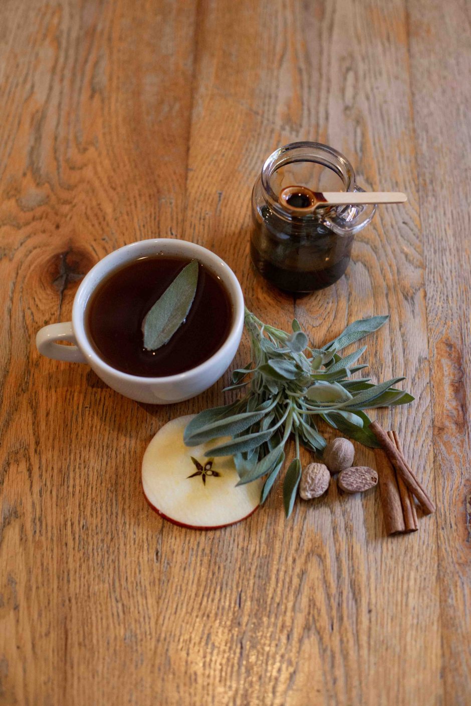 hot apple cider drink on table from fall and winter seasonal drink competition at Frothy Monkey. 